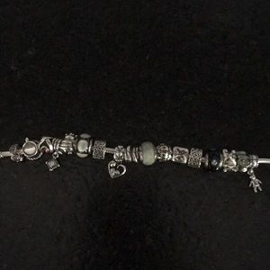 Pandora bracelet (7”) with 15 charms